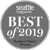 A gray circular badge with the text "seattle magazine BEST of 2019 Readers' Choice Winner."